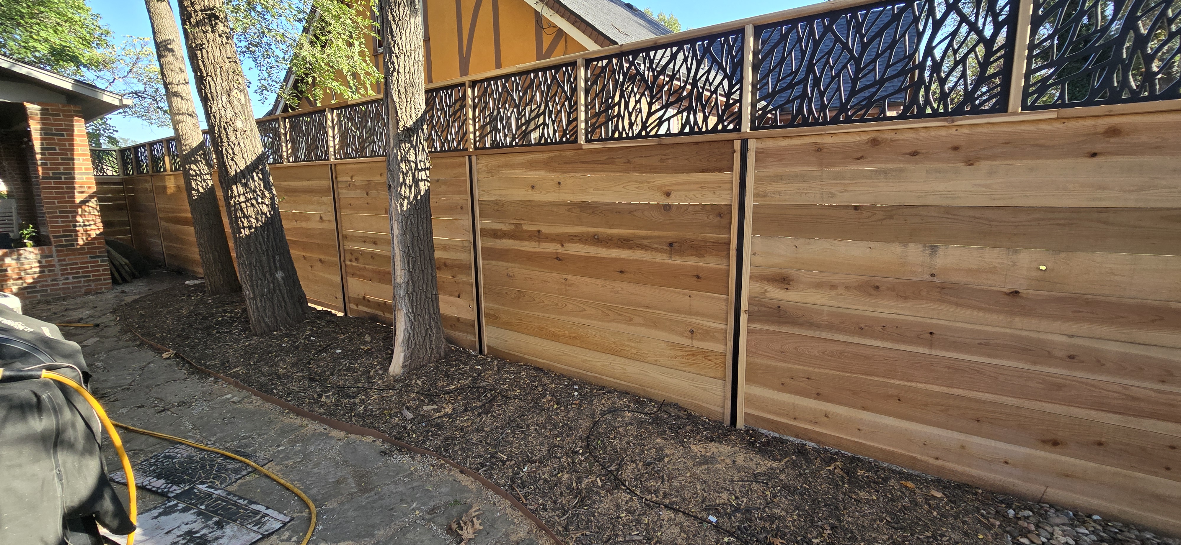 Residential fence installed by Elite Fencing and Decks